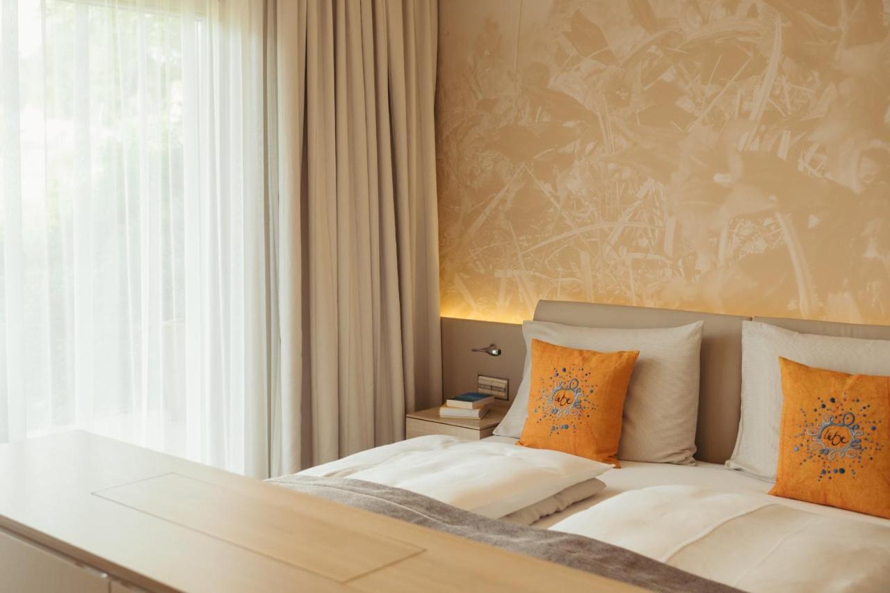 Strandhotel Am 魏森湖 外观 照片